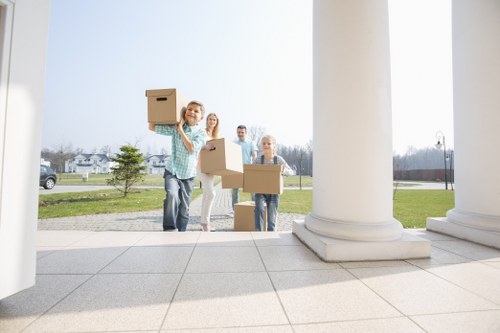 Packed boxes and furniture prepared for same day moving