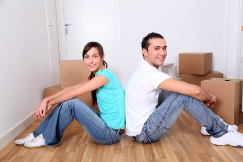 Students preparing boxes and bags for a move in Bow