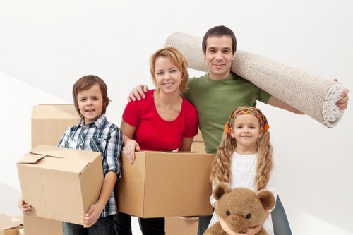 Moving boxes and household items from a Bow flat with stair access