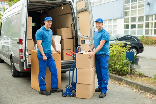 Mover wearing PPE during a removal in Bow