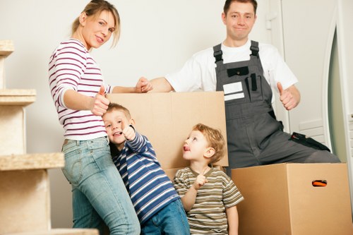Careful handling of furniture inside a removal van in Bow